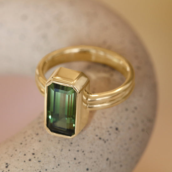 Angled view of Duo Ring / Green Emerald Cut Tourmaline