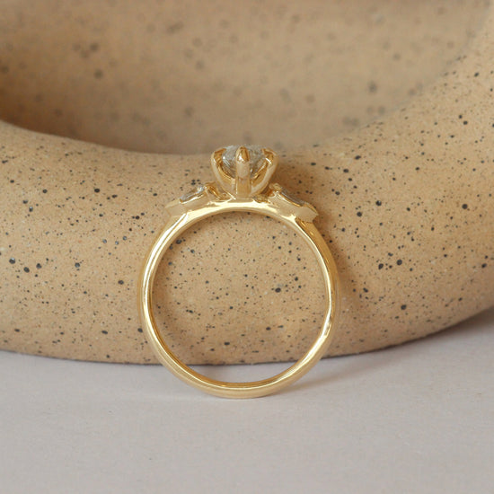 Lifestyle angled view of Bosc Ring / Lab Marquise & Pear Diamonds