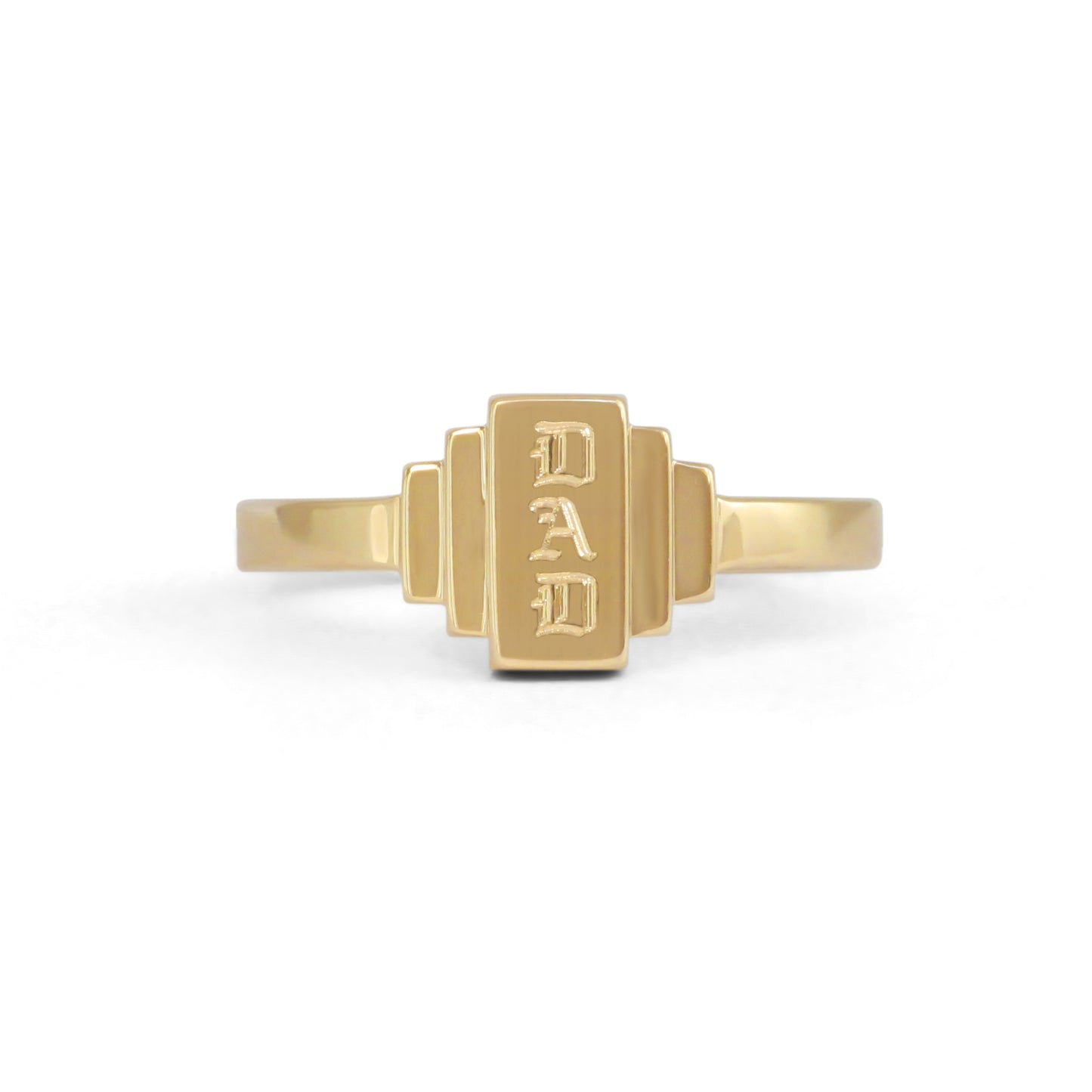 A 14k recycled gold step ring with DAD engraved on it.