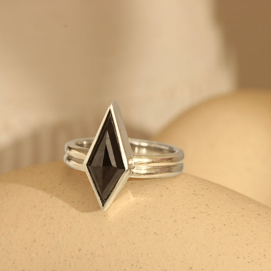 Angled lifestyle shot of Duo Ring / Kite Salt & Pepper Diamond