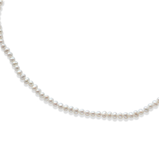 Close view of Pearl Necklace / Medium Off Round Soft White Pearls