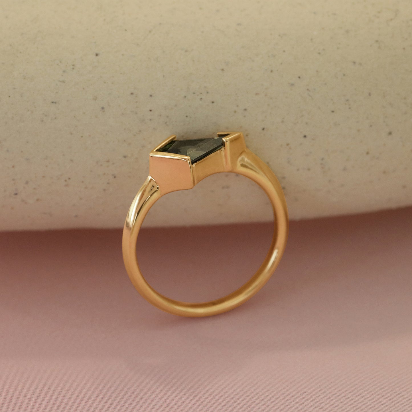 Angled view of Sideways Ring / Blue Kite Sapphire