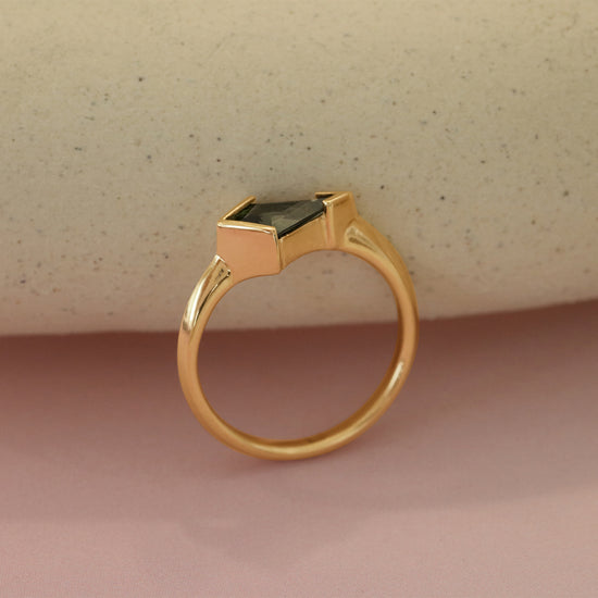 Angled view of Sideways Ring / Blue Kite Sapphire