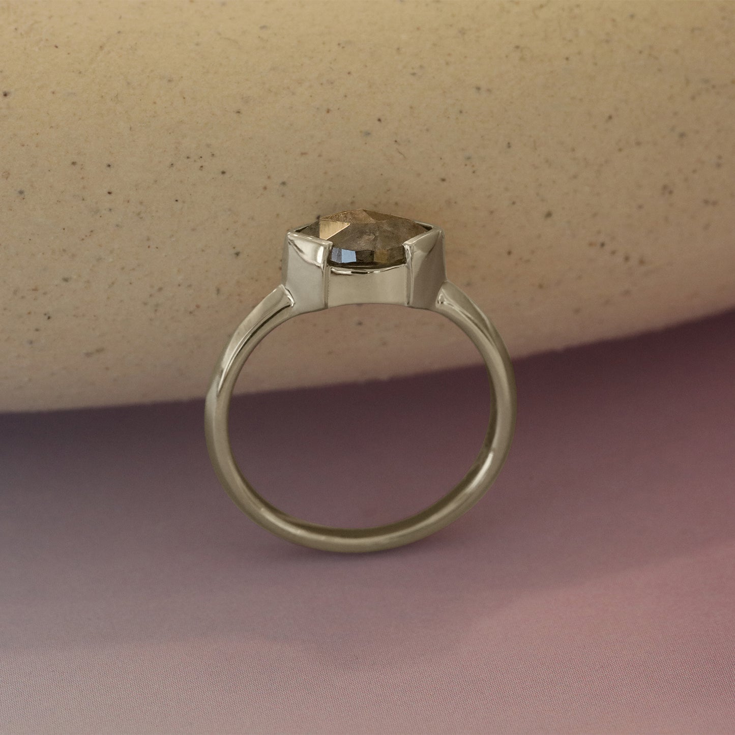 Lifestyle side profile view of Sideways Ring / Marquise Salt & Pepper Diamond + White Gold