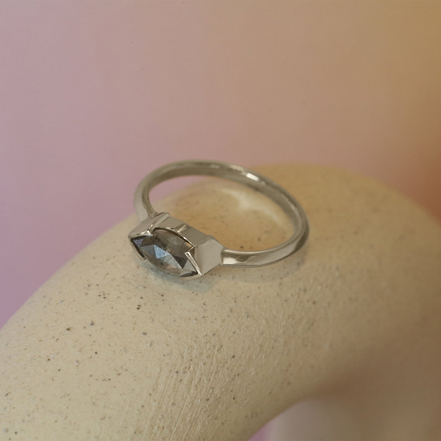 Lifestyle angled view of Sideways Ring / Marquise Salt & Pepper Diamond + White Gold